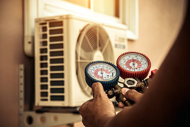 Professional Heat Pump Repair technician working in Upperco, MD
